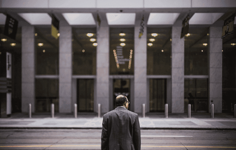 Man standing in front of building